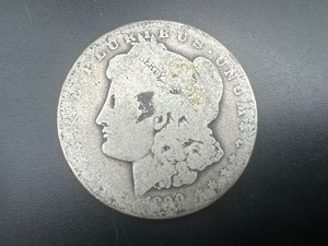 lot 33 image: 1890-O Morgan Silver Dollar