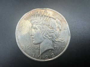 lot 42 image: 1923 Peace Silver Dollar