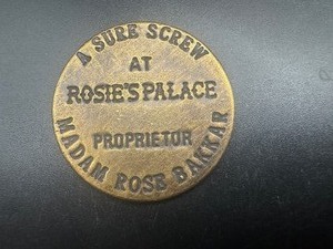 lot 98 image: Rosies Palace Brothel Token