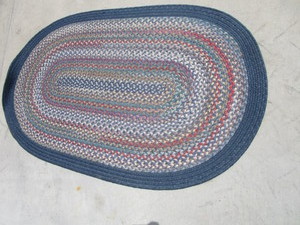 lot 25 image: Braided Throw Rug