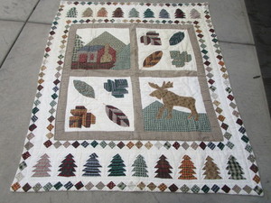 lot 47 image: Cabin Themed Lap Blanket