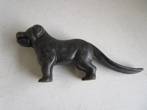 lot 66 image: Cast Dog Nutcracker, Antique