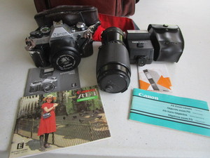 lot 131 image: Canon AE-1 1 35mm Camera, Zoom Lens