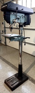 lot 64 image: Delta Floor Drill Press with Adjustable Table