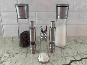 lot 34 image: Stainless Steel Salt, Pepper, and Spice Mill Set with Bunny Head Glass Shaker