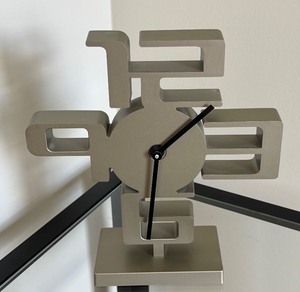 lot 42 image: Modern Umbra Wall Clock with Geometric Design
