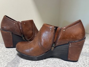 lot 125 image: Pair of Gently Used Brown Leather Wedge Dansko Shoes, Size 40