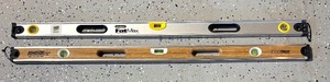 lot 194R image: G - Set of 2 48-Inch Levels by Stanley FatMax and Johnson EcoTech