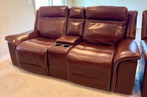 lot 11 image: Graham Leather Power Reclining Loveseat with Console