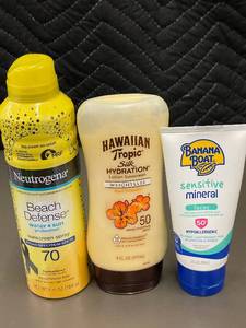 lot 39 image: Set of 3 Sunscreen Products Including Neutrogena, Hawaiian Tropic, and Banana Boat
