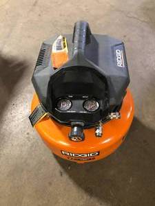 lot 8 image: Ridgid pancake compressor used Customer Returns See Pictures
