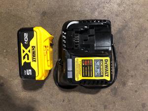 lot 23 image: DEWALT 20-Volt Maximum XR 5.0 Ah Battery Pack and Charger  Customer Returns See Pictures