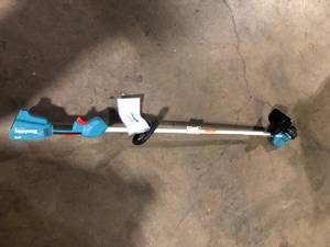 lot 28 image: Makita String Trimmer  Customer Returns See Pictures