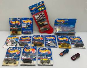 lot 9 image: Misc. Hot Wheels Miniature Die Cast Cars ( Most New On Pack) Some Packs Beat Up