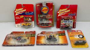 lot 27 image: Misc. Vintage Miniature Die Cast Johnny Lightning, Matchbox And More Cars (NIP)