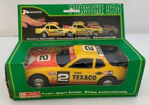 lot 28 image: 1980s Lucky Brand Pushmatic Porshe 924 (NIB)