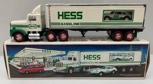 lot 29 image: Vintage HESS Gasolene Semi Truck With Porshe (NIB)