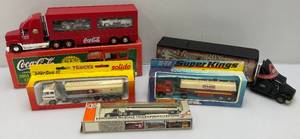 lot 32 image: Misc. Miniature Die Cast Semi Trucks Including Coca-Cola, Matchbox & More (NIB)
