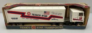 lot 37 image: 1980s TEXACO Bignotti-Cotter Racing Team Pressed Metal Semi Truck (New Old Stock)