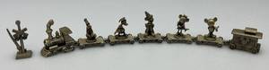 lot 129 image: Vintage Disney Miniature Pewter Train Set