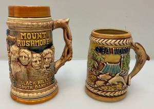 lot 201 image: Vintage Mid Century Made In Japan Mount Rushmore & Sea World Steins