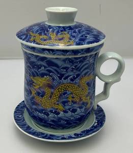lot 202 image: Vintage Dragon Themed Blue & White Three Piece Tea Cup And Saucer