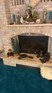 lot 77 image: Rustic Fireplace Decor Set with Figurines and Mantel Accessories