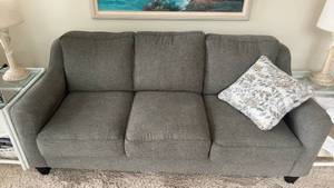 lot 138 image: Modern Gray Sofa with Decorative Pillow