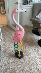 lot 146 image: Colorful Flamingo Statue with Green Ladder Accent