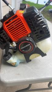 lot 303 image: Coocheer Gas-Powered Brush Cutter with Blades