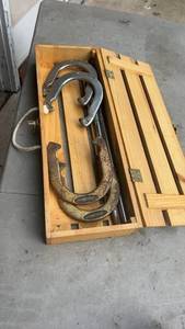 lot 319 image: Eddie Bauer Vintage Horseshoe Set with Wooden Crate