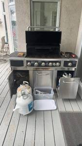 lot 343 image: Used Stainless Steel Gas Grill with Cover and Accessories
