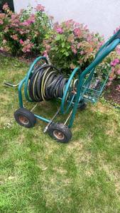 lot 354 image: Used Garden Hose Reel Cart with Hose