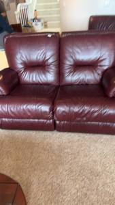 lot 430 image: Burgundy Leather Reclining Loveseat
