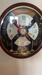 lot 445 image: Seiko Melodies in Motion Musical Wall Clock with Rotating Dial