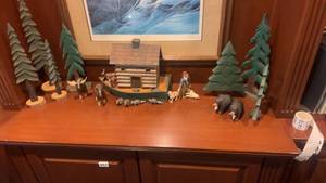 lot 469 image: Handcrafted Wooden Wilderness Scene with Log Cabin and Wildlife Figurines