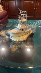 lot 474 image: Handcrafted Model Boat Dirty Dot on Rock Formation