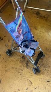 lot 526 image: Childs Folding Stroller with Frozen Theme Design