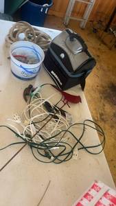 lot 548 image: Miscellaneous Garage Items Including Tool Bag, Rope, and Electrical Cords