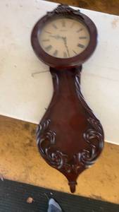 lot 573 image: Vintage Bulova Wood Wall Clock with Pendulum