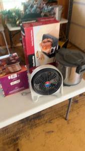 lot 579 image: Assorted Kitchen Appliances Set Chocolate Fondue Fountain, Carbon Steel Roaster, Super Deep Fryer, and Portable Heater