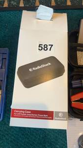 lot 587 image: RadioShack Pocket Jump StarterPower Bank with Carrying Case