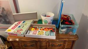 lot 619 image: Monopoly Board Game with Accessories and Knex Toy Collection