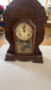 lot 642 image: Antique Wood-Carved Mantel Clock with Brass Accents