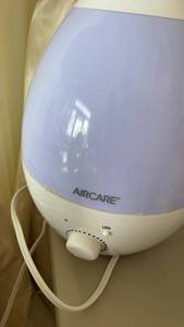lot 677 image: Used AirCare Ultrasonic Humidifier with LED Nightlight