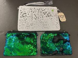 lot 9 image: Set of 3 Sequin and Faux Leather Wristlets by Handbag Republic