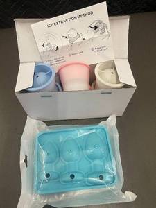 lot 42 image: 2 types of  Ice Cube Molds with Instruction Guide