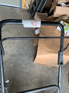 lot 42 image: Huskee 4hp lawnmower--runs