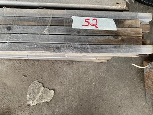 lot 52 image: Deck rail spindles (25) wood
