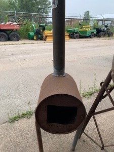lot 104 image: Vintage grinder, homemade stove